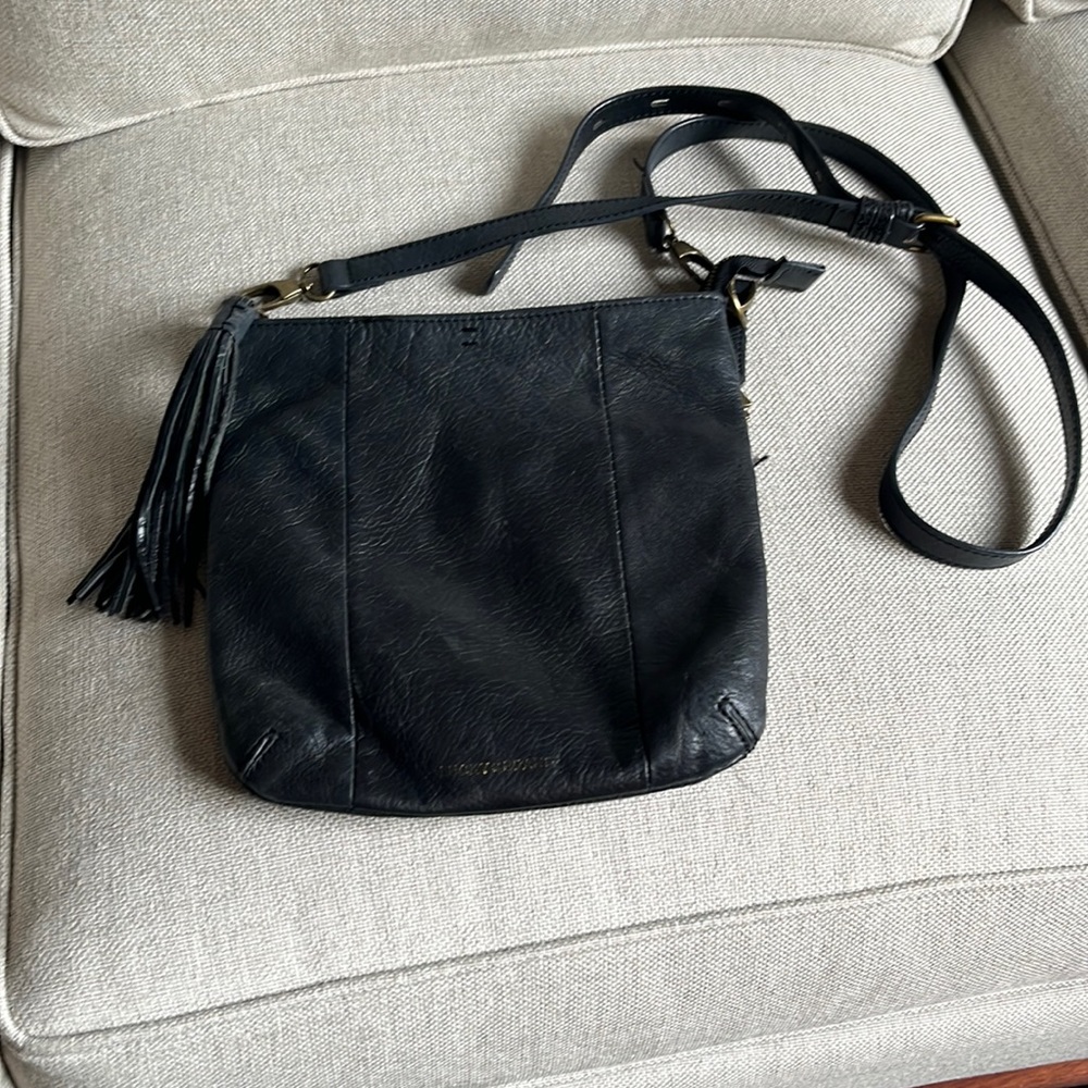 Black leather crossbody bag.